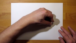 Pak een stevig stuk papier en teken hier met kaarsvet op