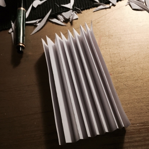 Vouw het terug in een harmonica